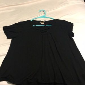 Black top with criss cross in the front